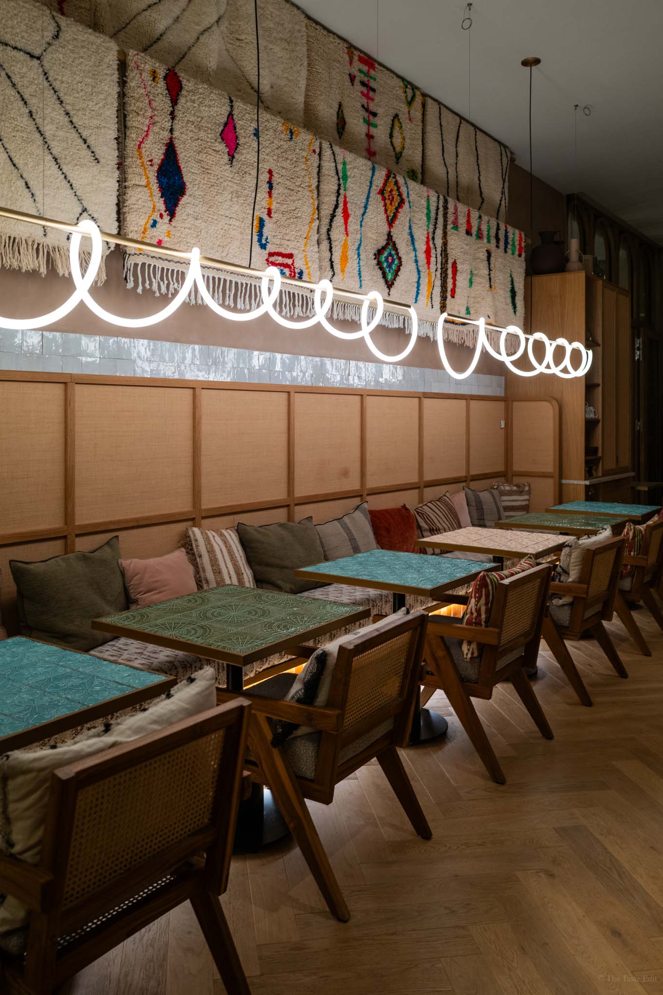 restaurant at the Bloom House Hotel and Spa with floral paper and onion signs 