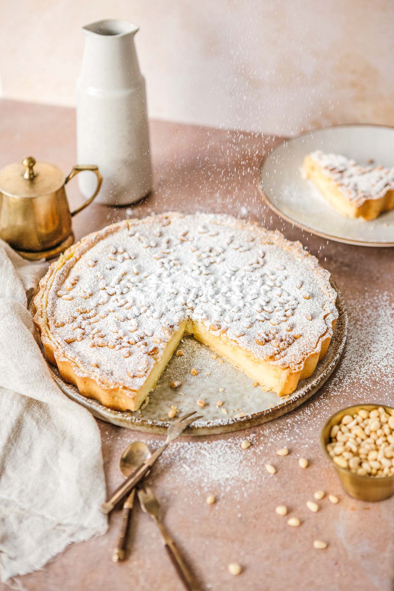 Best torta della nonna italian tart recipe with pine nuts topped with powdered sugar