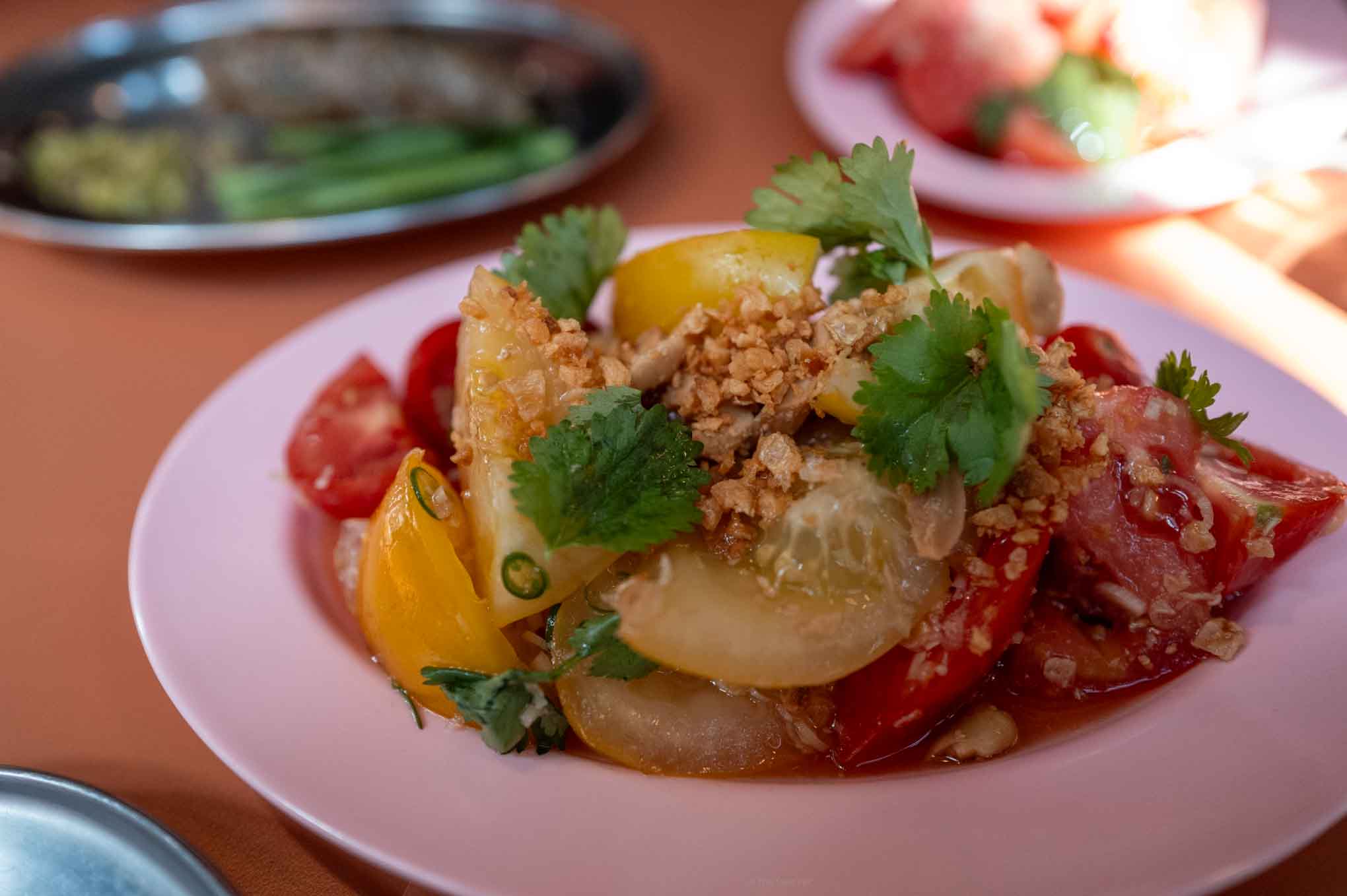 Smoked tomato salad with coriander and peanuts served at the new Singburi in Shoreditch - best Thai restaurant in London