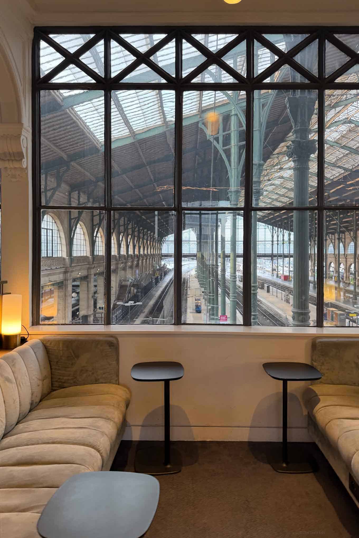 Luxurious Eurostar Premier dining lounge with panoramic station views.